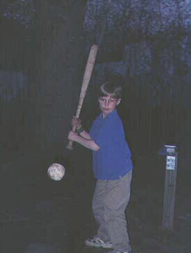 Nicholas Ganssle at bat in our backyard